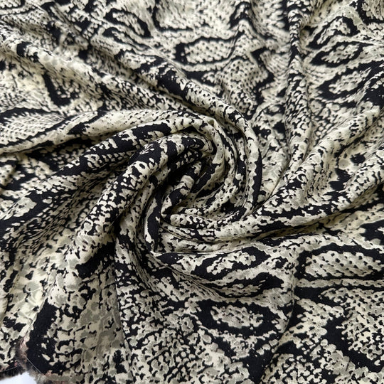 UB - Slither Into My Wardrobe - Rayon Blend Woven - Beige/Black Animal Print - 1.25M Bundle - True Deadstock fabric Fabric by private - Sustainable Textile | FABCYCLE