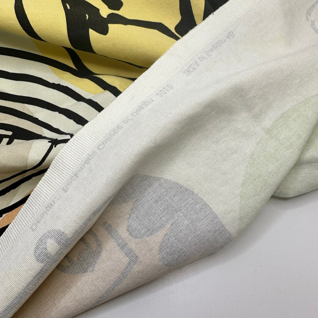 UB - Stand Out In A Crowd - Cotton Woven - Cream Multi Geometric Faces - 1.2M Bundle - True Deadstock fabric Fabric by private - Sustainable Textile | FABCYCLE