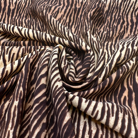 UB - Tigress - Water Resistant Jersey Poly/Spandex Knit - Cream/Brown Animal Print - 3.3M Bundle - True Deadstock fabric Fabric by private - Sustainable Textile | FABCYCLE