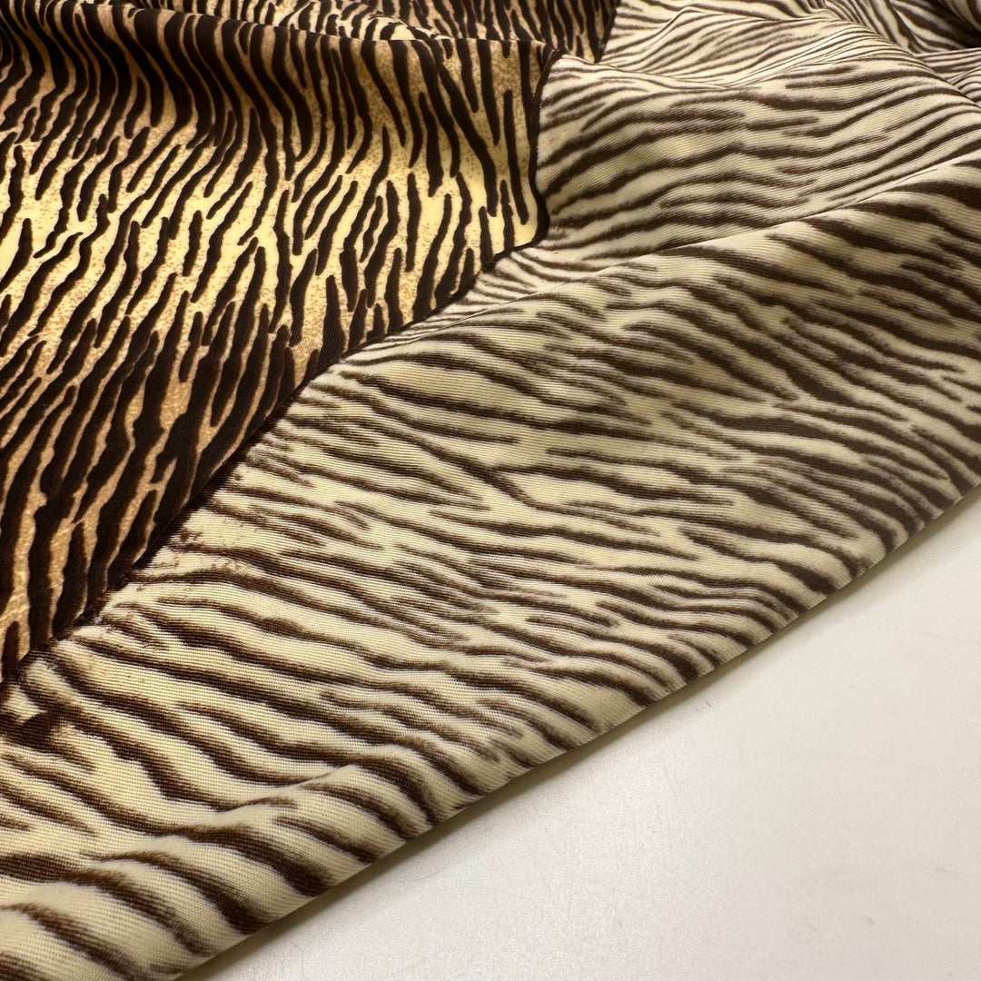 UB - Tigress - Water Resistant Jersey Poly/Spandex Knit - Cream/Brown Animal Print - 3.3M Bundle - True Deadstock fabric Fabric by private - Sustainable Textile | FABCYCLE