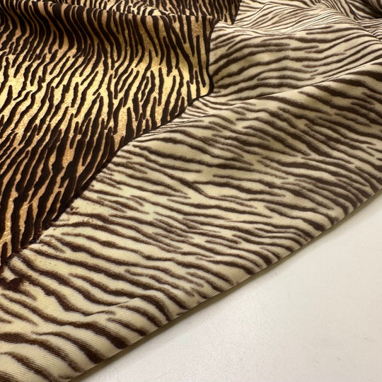 UB - Tigress - Water Resistant Jersey Poly/Spandex Knit - Cream/Brown Animal Print - 3.3M Bundle - True Deadstock fabric Fabric by private - Sustainable Textile | FABCYCLE