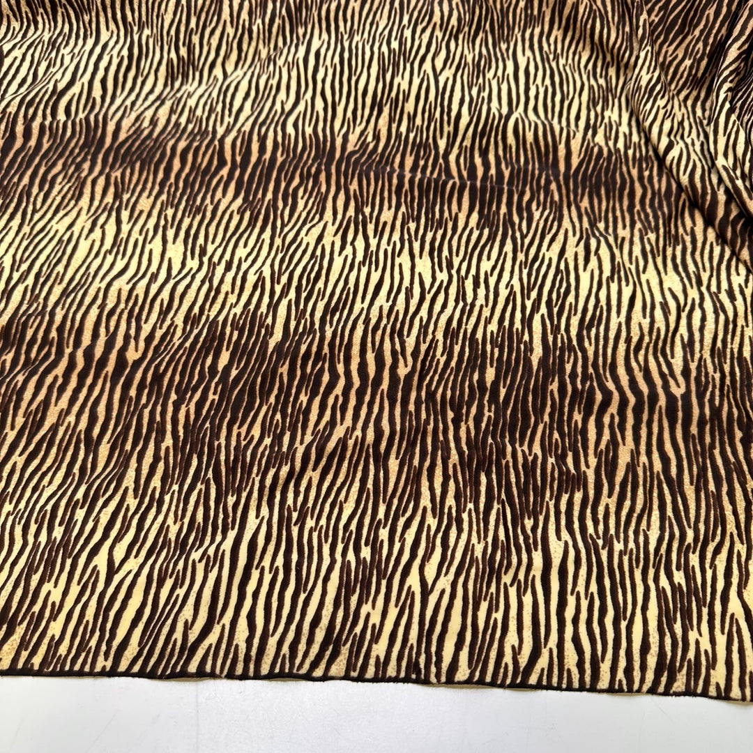 UB - Tigress - Water Resistant Jersey Poly/Spandex Knit - Cream/Brown Animal Print - 3.3M Bundle - True Deadstock fabric Fabric by private - Sustainable Textile | FABCYCLE