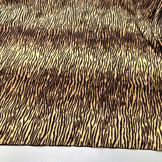 UB - Tigress - Water Resistant Jersey Poly/Spandex Knit - Cream/Brown Animal Print - 3.3M Bundle - True Deadstock fabric Fabric by private - Sustainable Textile | FABCYCLE