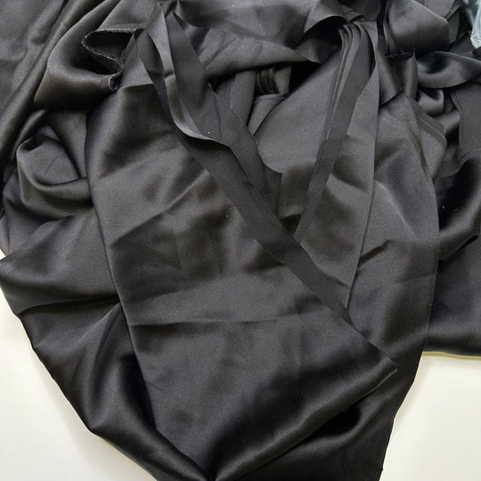 Under Her Power - Off Cuts Satin Silk Woven - Black - 0.5 Lb Bag - True Deadstock fabric Fabric by private - Sustainable Textile | FABCYCLE