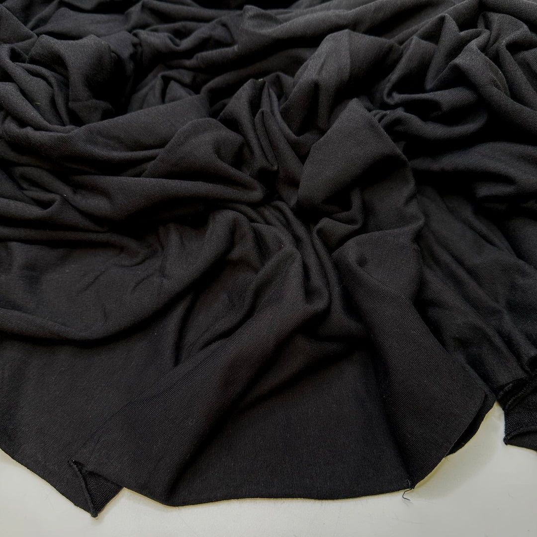 Used The Wrong Interfacing Weight - Jersey Fleece Bamboo Blend Knit - Black - 1.6M Bundle - True Deadstock fabric Fabric by private - Sustainable Textile | FABCYCLE