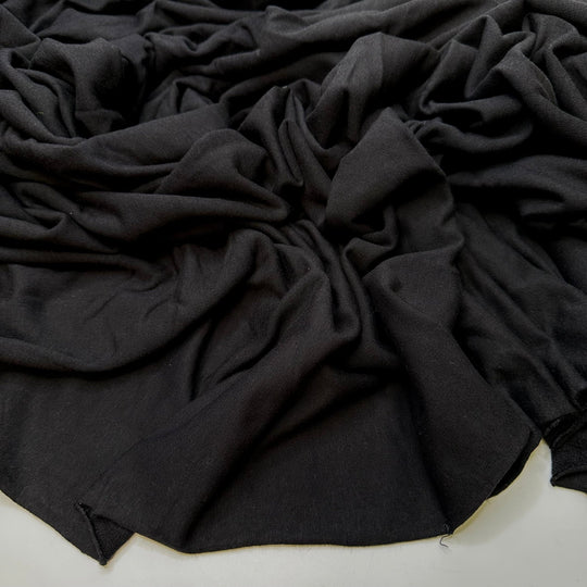 Used The Wrong Interfacing Weight - Jersey Fleece Bamboo Blend Knit - Black - 1.6M Bundle - True Deadstock fabric Fabric by private - Sustainable Textile | FABCYCLE