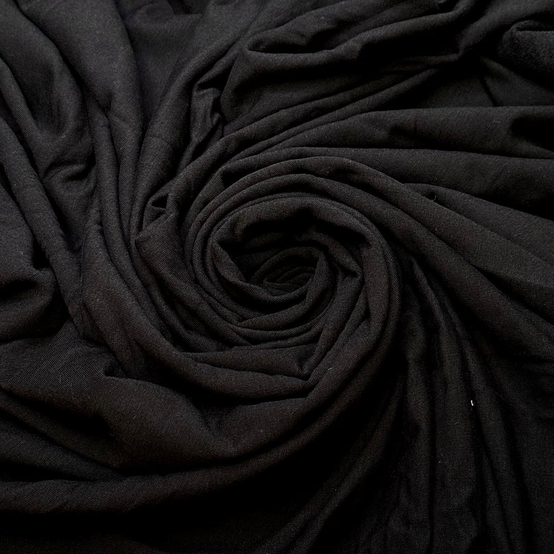 Used The Wrong Interfacing Weight - Jersey Fleece Bamboo Blend Knit - Black - 1.6M Bundle - True Deadstock fabric Fabric by private - Sustainable Textile | FABCYCLE