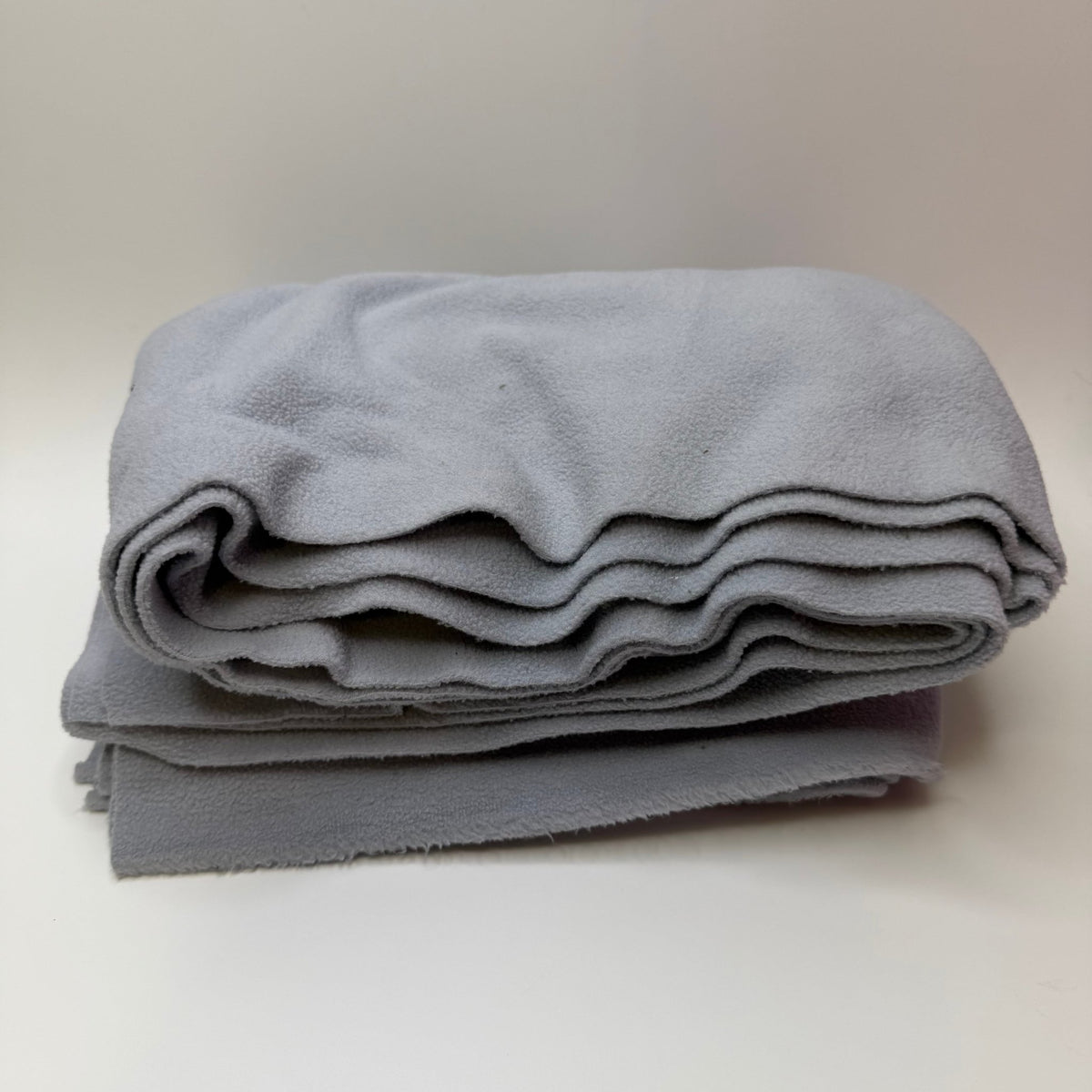 Vancouver Overcast - Fleece Polyester Blend Knit - Light Grey - Off Cut - 4 Pack - True Deadstock fabric Fabric by private - Sustainable Textile | FABCYCLE