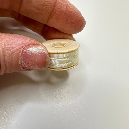 Wax Nylon Thread On Paper Bobbin Tools - Cream/White - Individual - True Deadstock supplies Fabric by private - Sustainable Textile | FABCYCLE