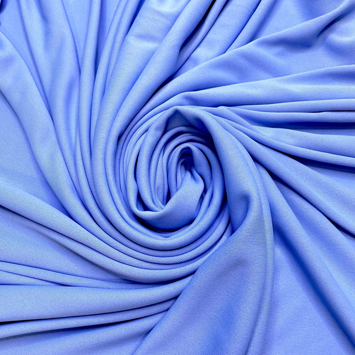 Where The Mountains Meet The Sea - Jersey Polyester Blend Knit - Light Blue - 1M Bundle - True Deadstock fabric Fabric by private - Sustainable Textile | FABCYCLE