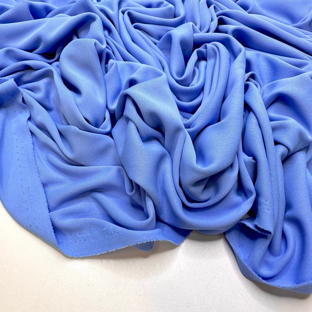 Where The Mountains Meet The Sea - Jersey Polyester Blend Knit - Light Blue - 1M Bundle - True Deadstock fabric Fabric by private - Sustainable Textile | FABCYCLE