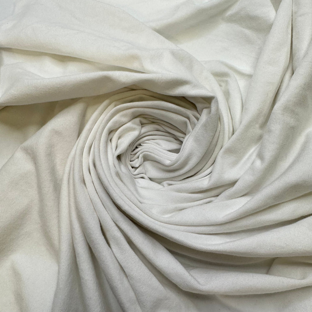 Winter Olympics - Jersey Cotton/Spandex Knit - White - 2.4M Bundle - True Deadstock fabric Fabric by private - Sustainable Textile | FABCYCLE
