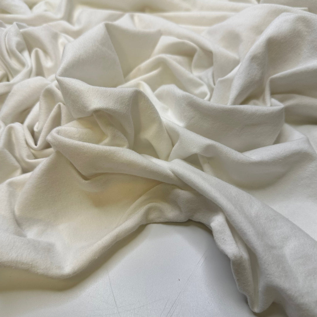 Winter Olympics - Jersey Cotton/Spandex Knit - White - 2.4M Bundle - True Deadstock fabric Fabric by private - Sustainable Textile | FABCYCLE