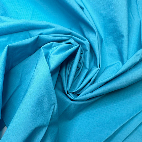 With A Perfect Flourish - Ripstop Nylon Woven - Light Blue - 1.5M Bundle - True Deadstock fabric Fabric by private - Sustainable Textile | FABCYCLE