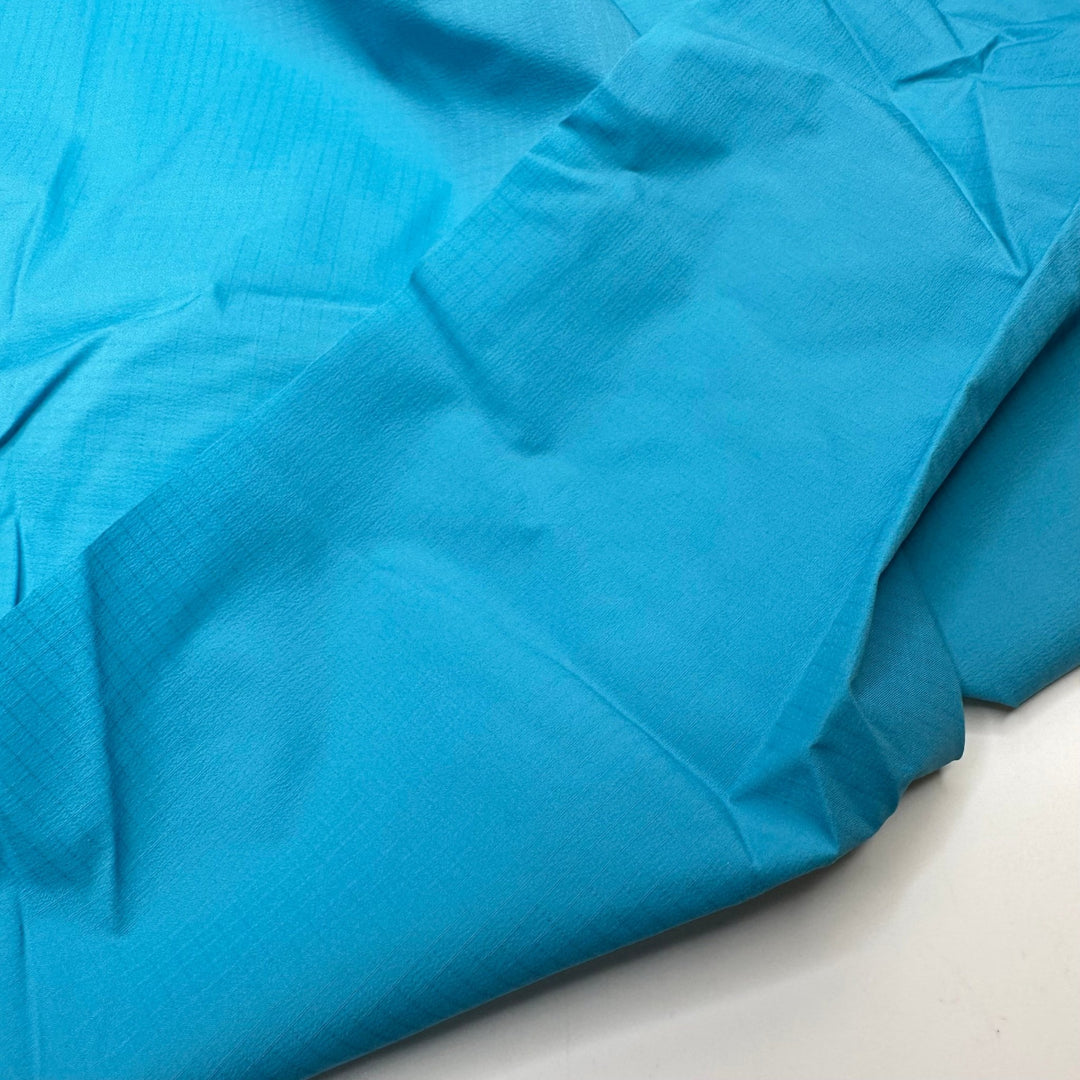 With A Perfect Flourish - Ripstop Nylon Woven - Light Blue - 1.5M Bundle - True Deadstock fabric Fabric by private - Sustainable Textile | FABCYCLE
