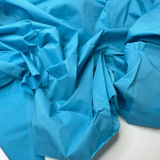 With A Perfect Flourish - Ripstop Nylon Woven - Light Blue - 1.5M Bundle - True Deadstock fabric Fabric by private - Sustainable Textile | FABCYCLE