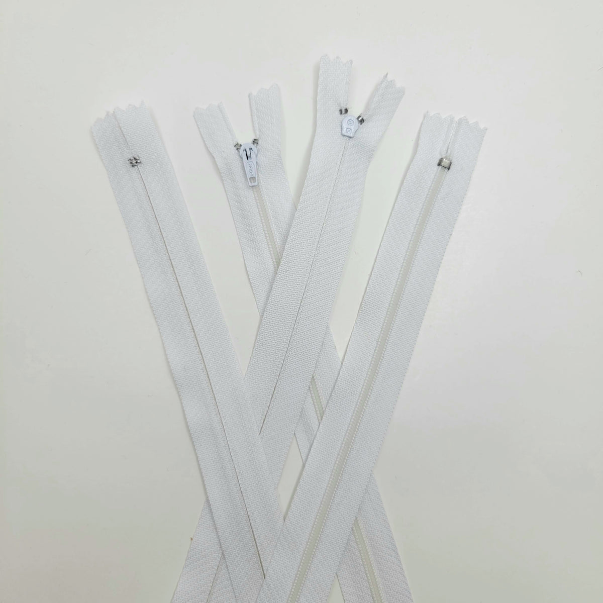 19" Zoom Locking Zipper Head - Coil Zipper - Closed End - White - FABCYCLE Deadstock and Sustainble Fabrics and Sewing Supplies (6603032494193)