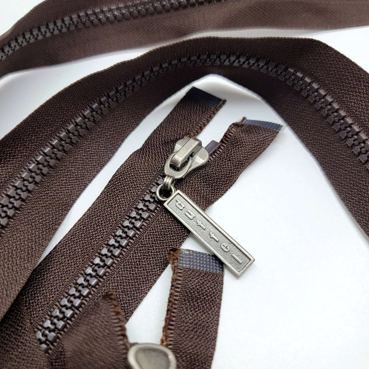 27" Duffel Molded Plastic Zipper - Separating - Brown - FABCYCLE Deadstock and Sustainble Fabrics and Sewing Supplies (6603039768689)