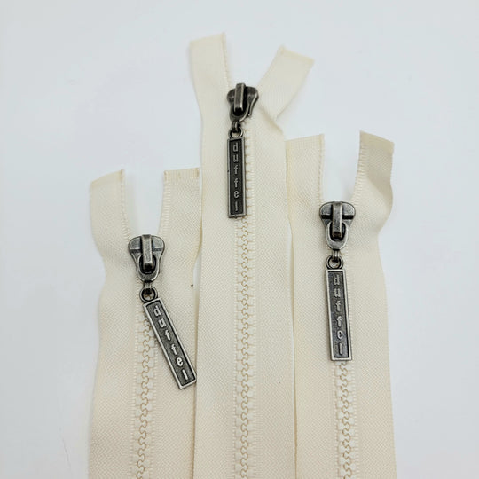 26" Duffel Molded Plastic Zipper - Separating - Cream - FABCYCLE Deadstock and Sustainble Fabrics and Sewing Supplies (6604289048689)