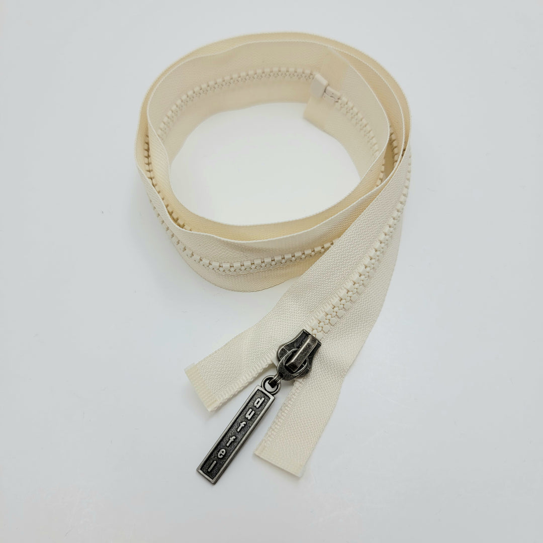 26" Duffel Molded Plastic Zipper - Separating - Cream - FABCYCLE Deadstock and Sustainble Fabrics and Sewing Supplies (6604289048689)