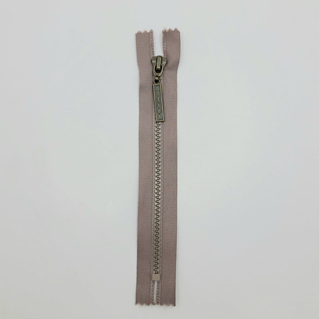 7" Duffel Molded Plastic Zipper - Closed End - Beige - FABCYCLE Deadstock and Sustainble Fabrics and Sewing Supplies (6604298485873)