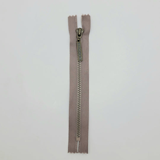7" Duffel Molded Plastic Zipper - Closed End - Beige - FABCYCLE Deadstock and Sustainble Fabrics and Sewing Supplies (6604298485873)