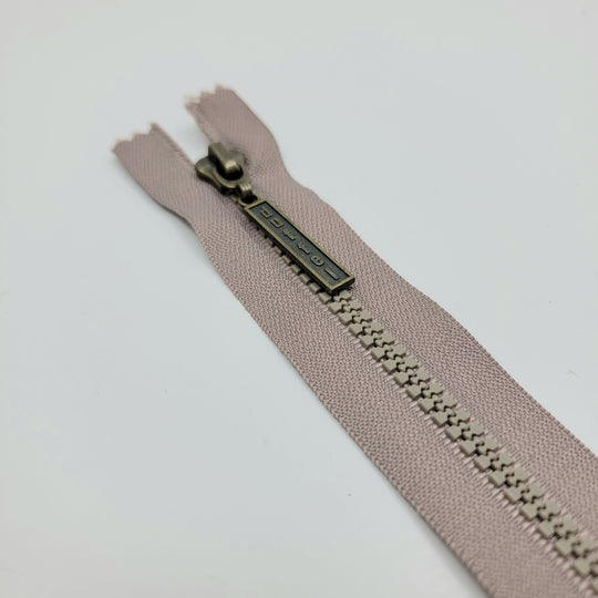 7" Duffel Molded Plastic Zipper - Closed End - Beige - FABCYCLE Deadstock and Sustainble Fabrics and Sewing Supplies (6604298485873)