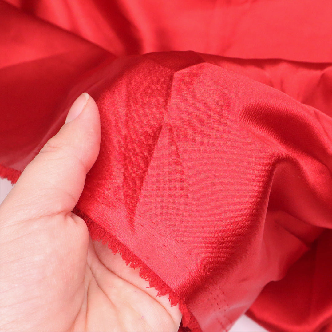 Wonder Woman Red - Polyester Satin Woven - Red - 1/2 Meter - FABCYCLE Deadstock and Sustainble Fabrics and Sewing Supplies (4634681737329)