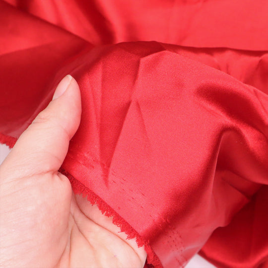 Wonder Woman Red - Polyester Satin Woven - Red - 1/2 Meter - FABCYCLE Deadstock and Sustainble Fabrics and Sewing Supplies (4634681737329)