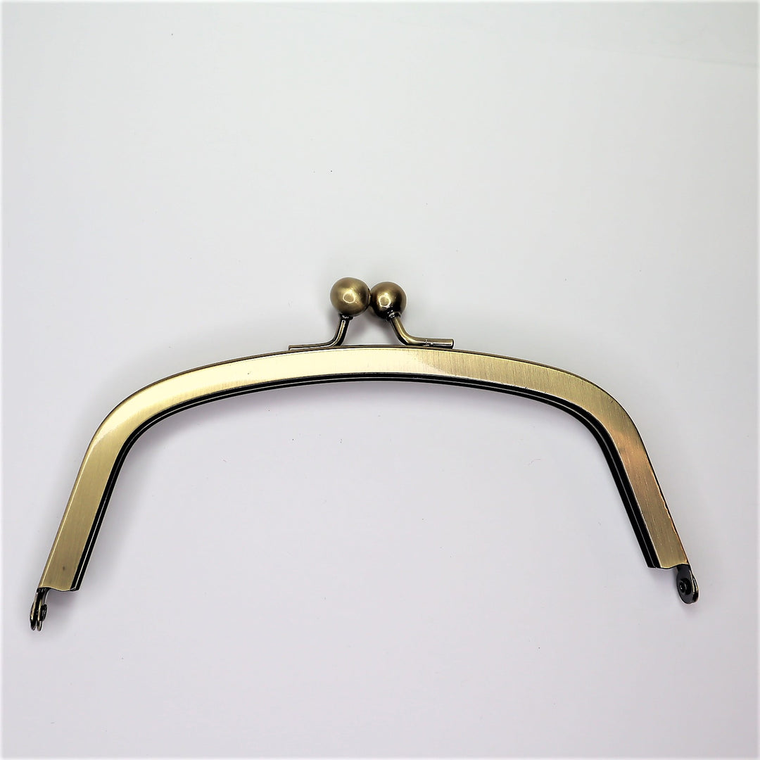 Metal Purse Frame - Half Oval - Brass - FABCYCLE Deadstock and Sustainble Fabrics and Sewing Supplies (6584107008113)