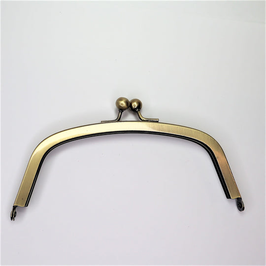 Metal Purse Frame - Half Oval - Brass - FABCYCLE Deadstock and Sustainble Fabrics and Sewing Supplies (6584107008113)