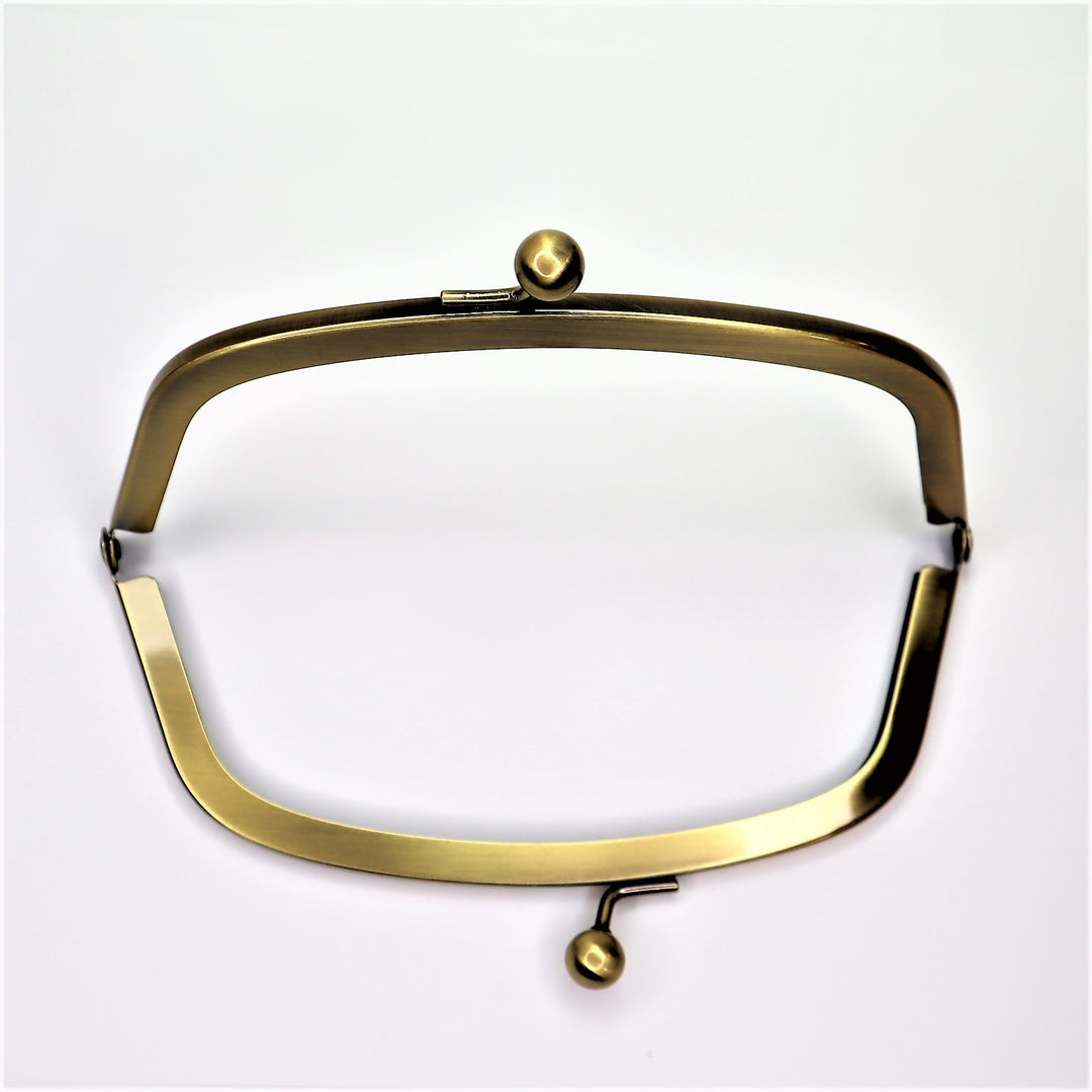 Metal Purse Frame - Half Oval - Brass - FABCYCLE Deadstock and Sustainble Fabrics and Sewing Supplies (6584107008113)