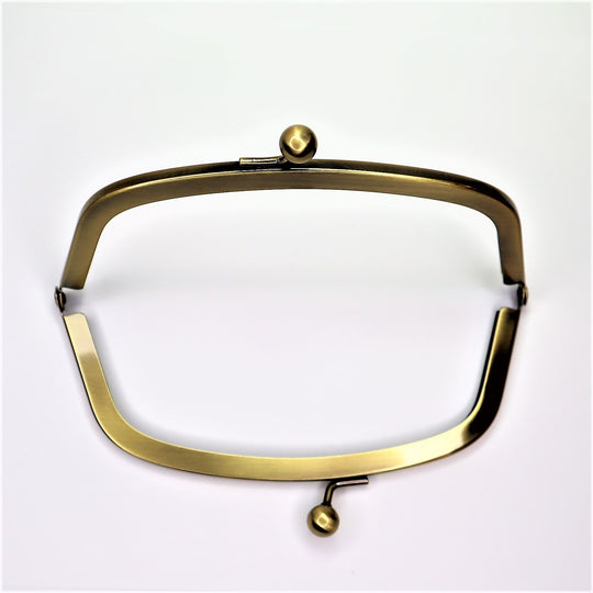 Metal Purse Frame - Half Oval - Brass - FABCYCLE Deadstock and Sustainble Fabrics and Sewing Supplies (6584107008113)