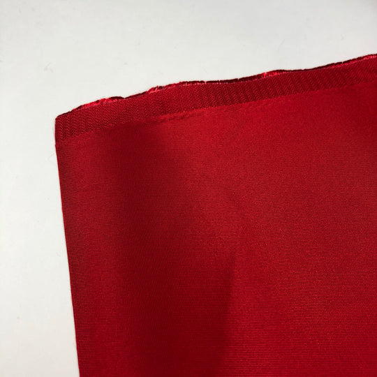 Cranberry - Polyester Satin Woven w/ Wax Backing - Red - 1/2 Meter - FABCYCLE Deadstock and Sustainble Fabrics and Sewing Supplies (4631726227569)