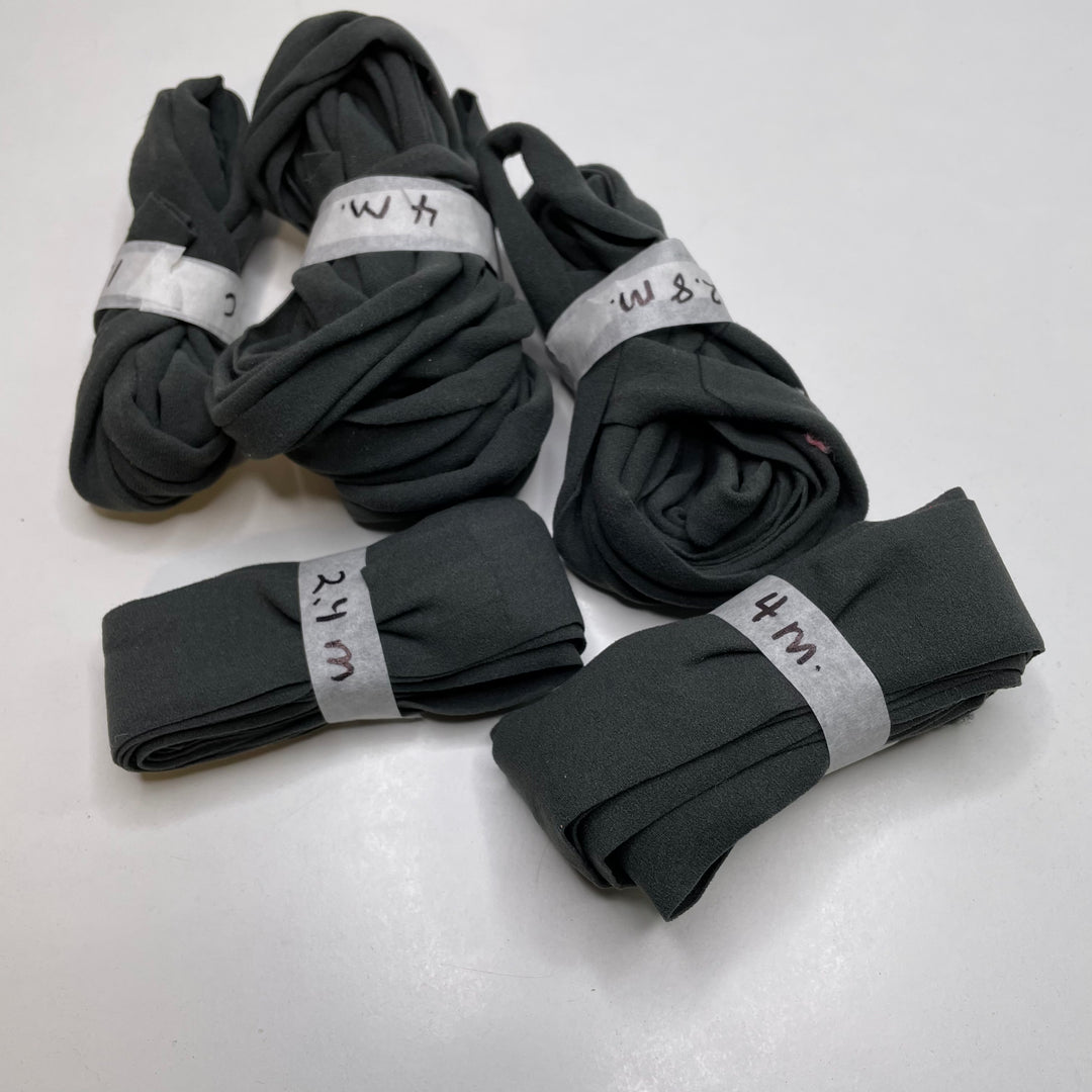 1 1/2” Bias Tape - Poly Spandex - Grey - FABCYCLE Deadstock and Sustainble Fabrics and Sewing Supplies
