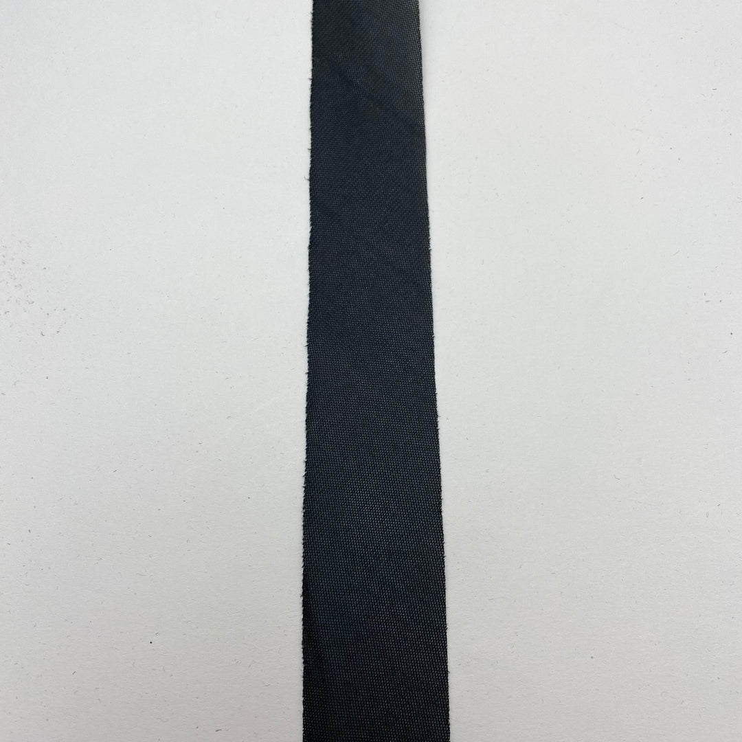 1 1/4” Bias Tape - Synthetic Interfacing- Black - FABCYCLE Deadstock and Sustainble Fabrics and Sewing Supplies (6544077357169)