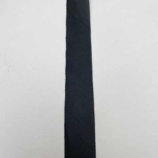 1 1/4” Bias Tape - Synthetic Interfacing- Black - FABCYCLE Deadstock and Sustainble Fabrics and Sewing Supplies (6544077357169)