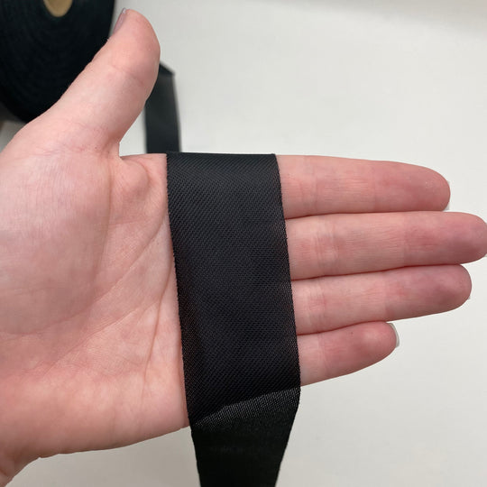 1 1/4” Bias Tape - Synthetic Interfacing- Black - FABCYCLE Deadstock and Sustainble Fabrics and Sewing Supplies (6544077357169)