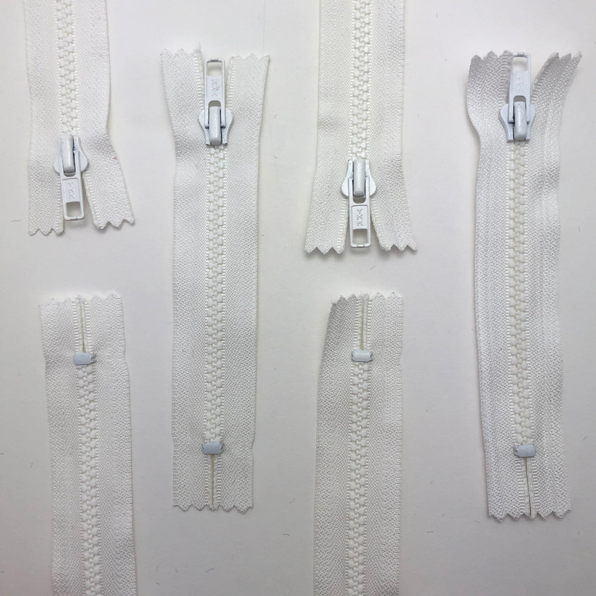 5" Plastic Molded Zipper - Closed-End - White / White - Individual - FABCYCLE Deadstock and Sustainble Fabrics and Sewing Supplies (4594468880497)